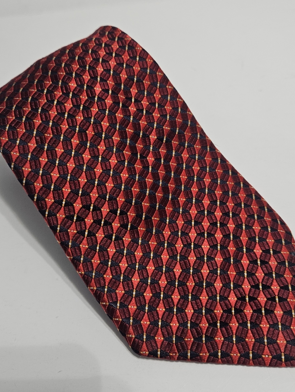 Ike Behar New York Silk Burnt Red Mens Neck Tie with Navy Blue & Yellow Geometri